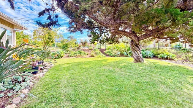 Building Photo - Beautiful Craftsman-style Home with fenced yard space, detached garage and additional parking in ...