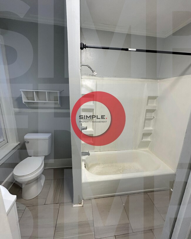 Building Photo - Three Bedroom one bath with off street parking