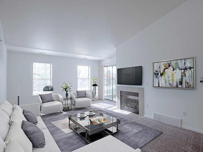 Spacious Living Room with Natural Light and Fireplace - River Oaks