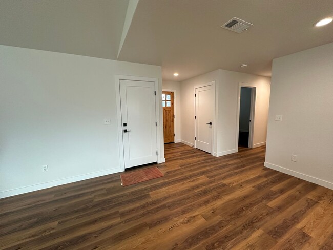 Building Photo - Updated Home with Island Kitchen, LVP Flooring, and Yard Care Included!