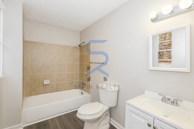 Building Photo - Move in before November 30th and choose your reward: a $250 Amazon Gift Card or a 55 Smart TV!