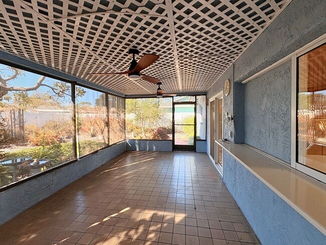 Building Photo - 3 Bed 2 Bath Home with Large Fenced Backyard & Screened Lanai — Available Now