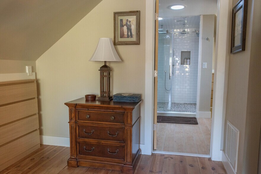 From Primary Bedroom int Master Bathroom. Both have built in storage. - 417 E Government Ave