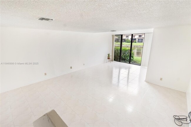 Building Photo - 3952 Cocoplum Cir