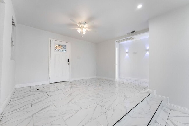 Building Photo - Single Story,  Totally Renovated , 3 bedroom, 2 bathroom Home with  extensive privacy and gated h...