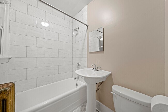 Building Photo - Sunny, Convertible Studio with Two Rooms a...