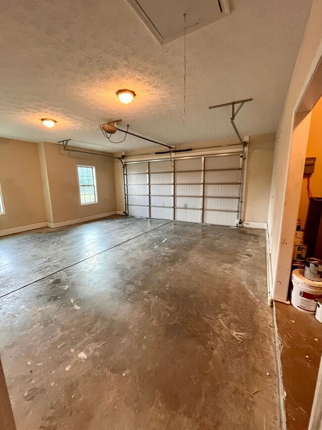 Building Photo - Spacious 3-Bedroom Home with Garage, Large...