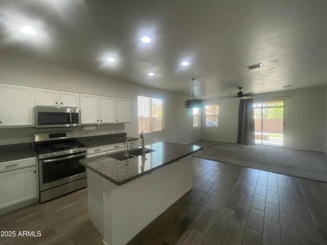Building Photo - 13159 W Rowel Rd