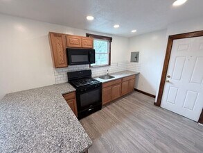 Building Photo - Perfect location, private . Clean , modernized and bright
