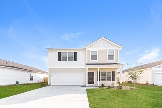 Building Photo - Modern 4 Bedroom Home in Mackey Farms