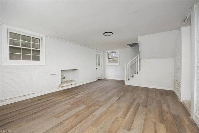 Building Photo - Earn Wealth While Leasing - Like a Homeown...