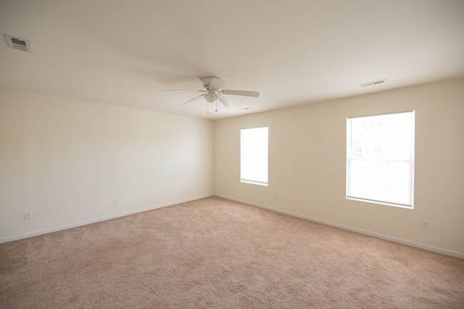 Building Photo - Spacious beautiful 4 bedroom 2.5 bath home  In Greensboro with an office/upstairs loft/ sunroom/ ...