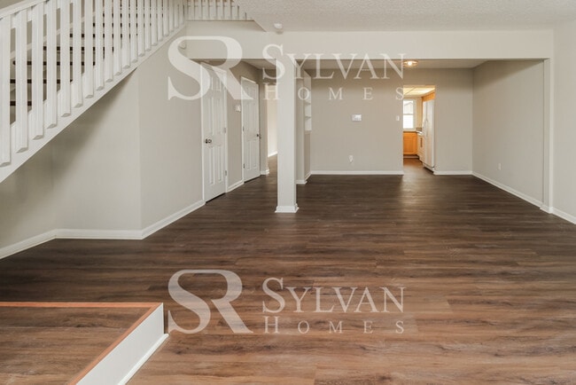 Building Photo - Welcome to this charming abode.