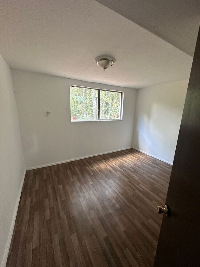 Building Photo - COMING SOON! Charming Split-Level Single-F...