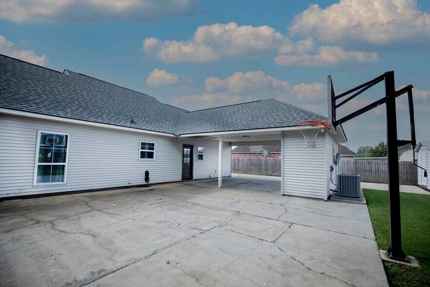 Covered parking with detached storage shed - 11284 Shelly St