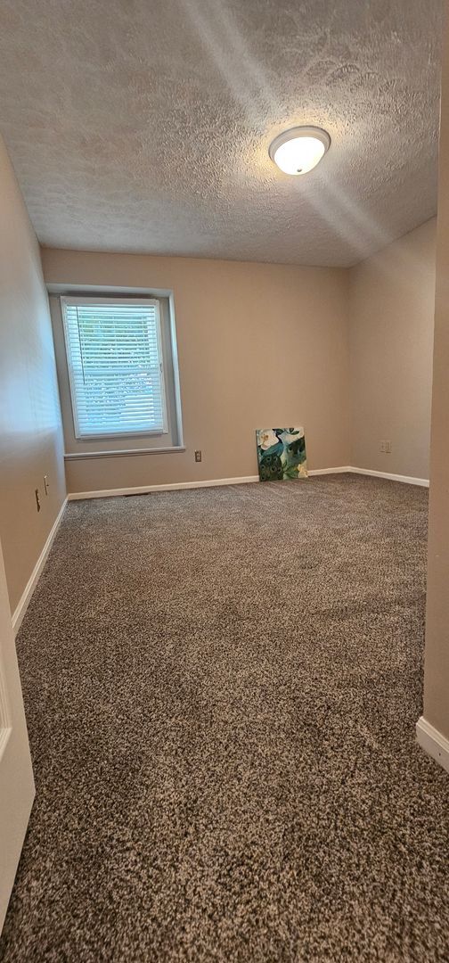 Building Photo - RANCH STYLE 2 BEDROOM CONDO FOR LEASE