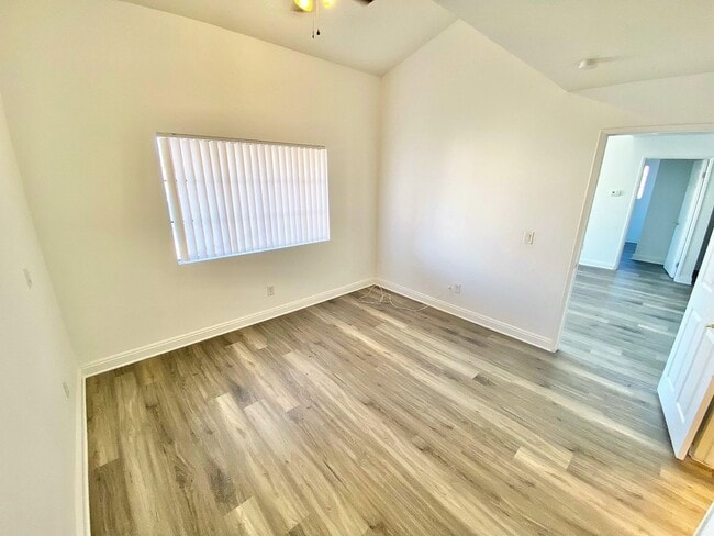 Building Photo - CONDOMINIUM IN A GATED COMMUNITY WITH 2 BE...