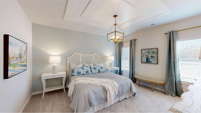 A serene escape, the master is comprised of a spacious bedroom perfect for peace and restoration - 15580 Ruthie Lynn Dr