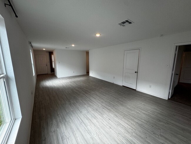 Building Photo - Modern 2024 New-Build with Open-Concept Living and Private Primary Suite in Waterwheel Subdivision