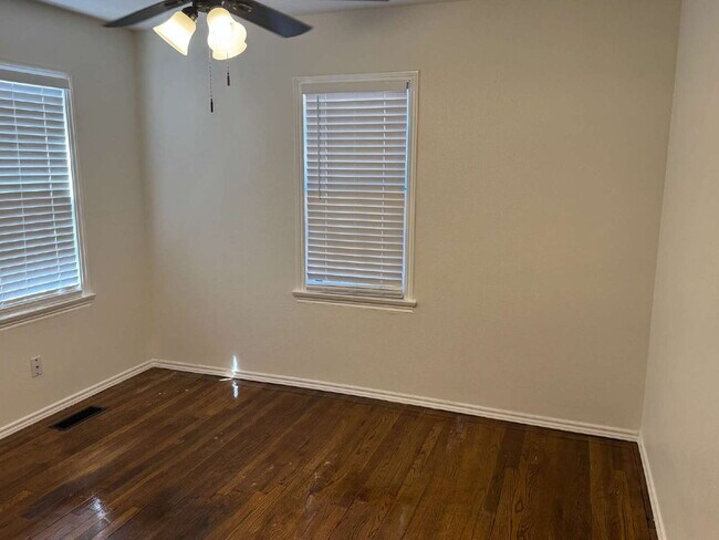 Building Photo - "Charming 4-Bed Lubbock Retreat: Granite Kitchen, Hardwood Elegance & Cozy Fireplace!"