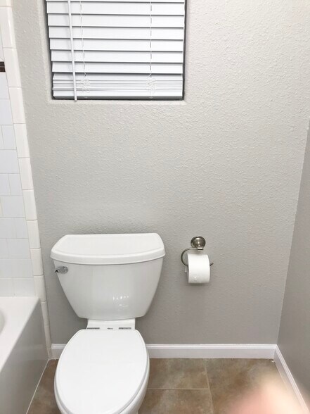 New elongated commode, pressure assisted, master bath - 3620 Mirror Ct