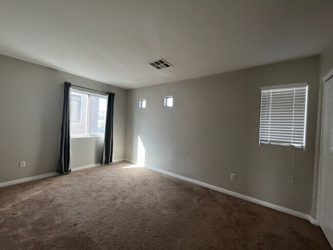 Building Photo - Welcome to this stunning 3-story home loca...