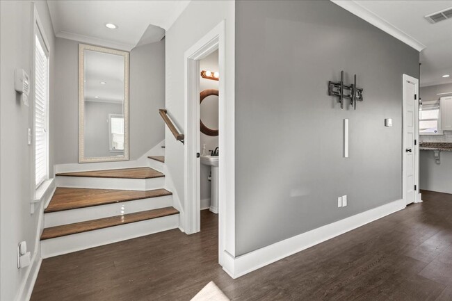 Building Photo - Your New Home! 3 Beds, 2.5 Baths, Hardwood Throughout, Fenced Back Yard, 3 Patios, + Community Pool!