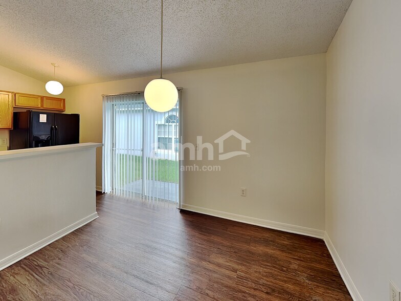 Building Photo - 6544 Gentle Oaks Dr S