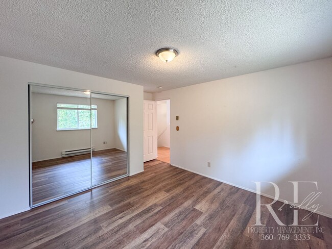Building Photo - Spacious 4-Bedroom Home with Garage on Qui...
