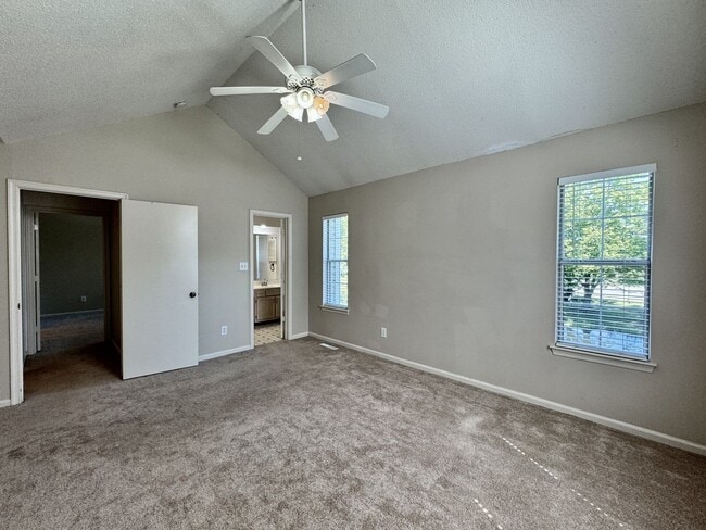 Building Photo - Available 06-15-25! End-Unit Condo w/2 Pri...