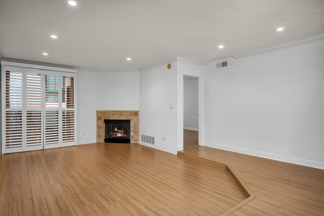 Living room w gas fireplace - 1000 S Westgate Ave