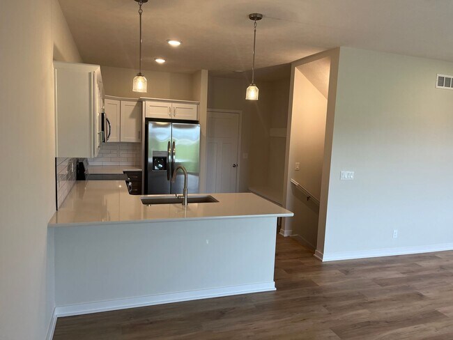 Building Photo - Spacious 5-Bedroom Duplex Near Asbury Elementary with Finished Basement & Full Amenities