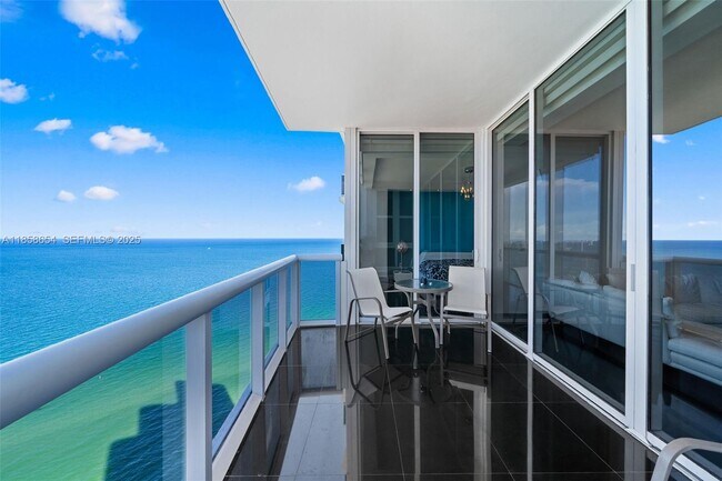 Building Photo - 18201 Collins Ave