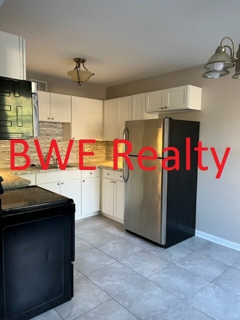 Building Photo - Charming 1 Bedroom Franklin Condo