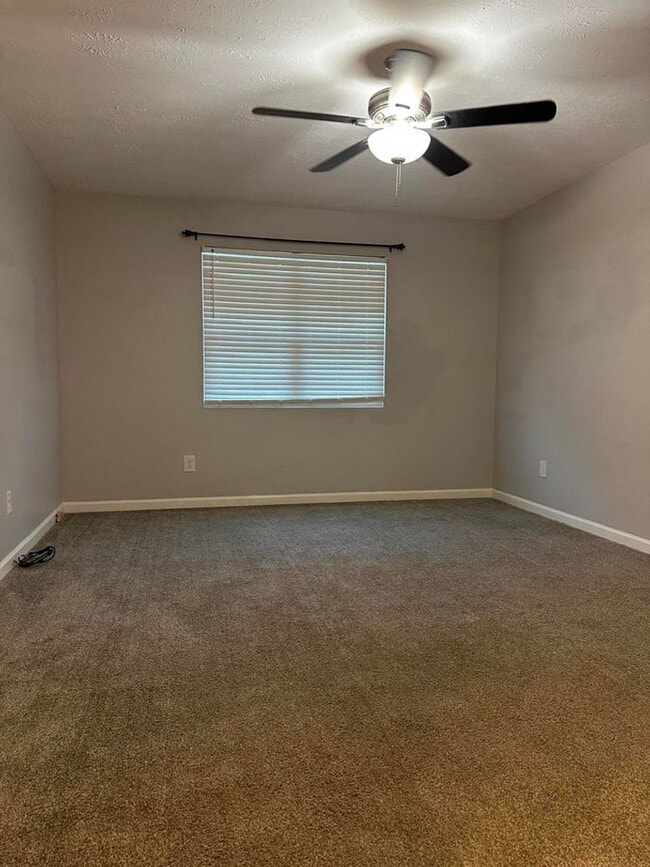 Building Photo - Move-In Ready Corner-Lot Home with Wraparound Porch Near Fort Eisenhower