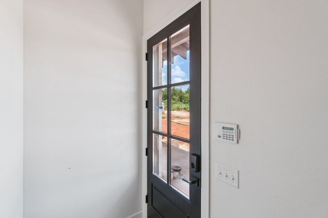 Building Photo - Bright. Clean. Calm. Your Elevated One-Bed...