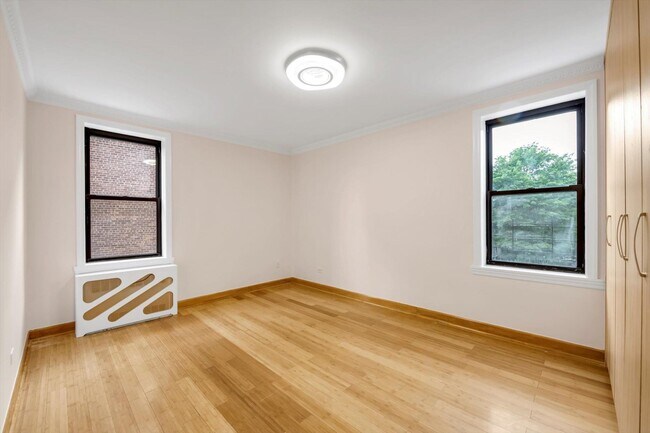 Building Photo - 65-30-65108 108th St