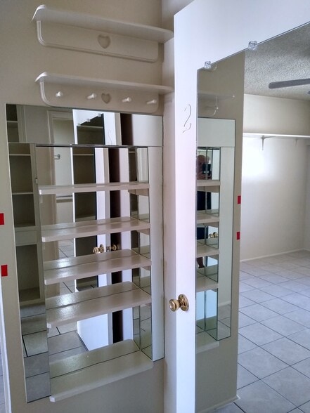 mirrored shelves - sunny - 1843 E Palmyra Ave