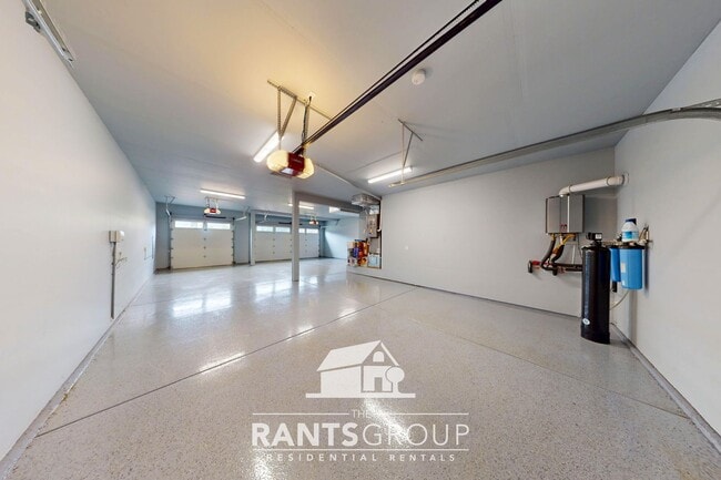 Building Photo - Luxury 4-Bedroom Home with 5-Car Garage & ...