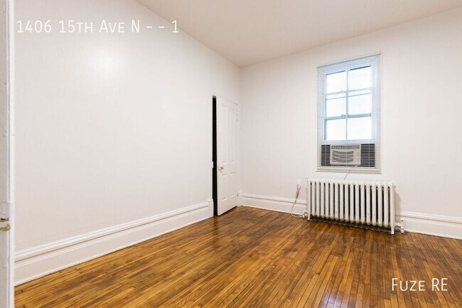 Building Photo - 1406 N 15th Ave