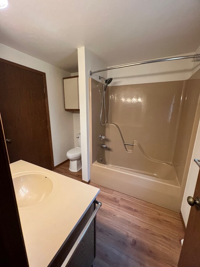 Main Bathroom Upstairs - New flooring, toilet, and showerhead - 2381 Remington Rd
