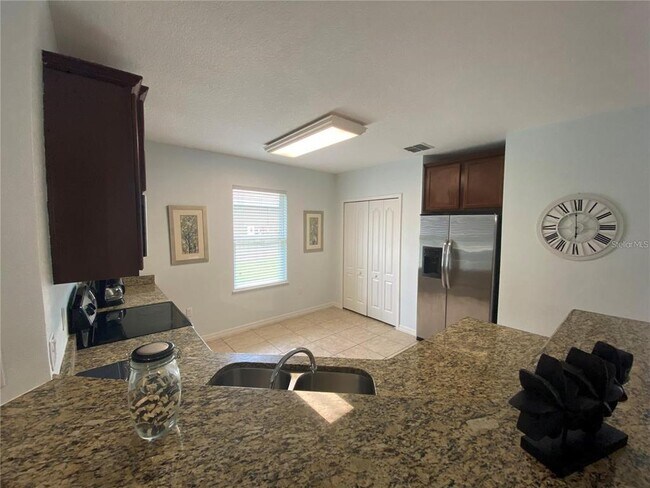 Building Photo - 9027 Paolos Pl