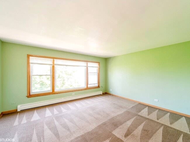 Building Photo - 4752 N Menard Ave
