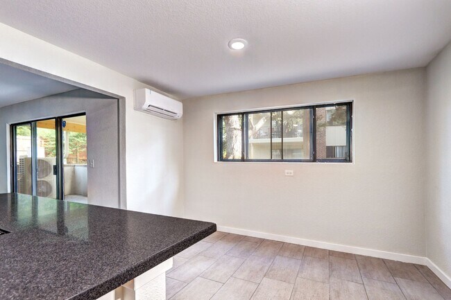 Building Photo - Updated 2 Bedroom 2 Bath Condo With Pool A...