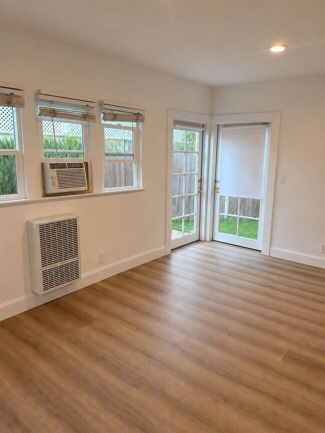 downstairs bedroom overlooking private yard - 6107 Saturn St