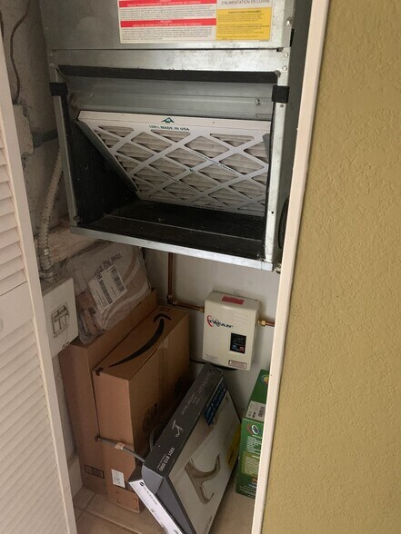 New AC and Tankless water heater closet - 9310 Fontainebleau Blvd