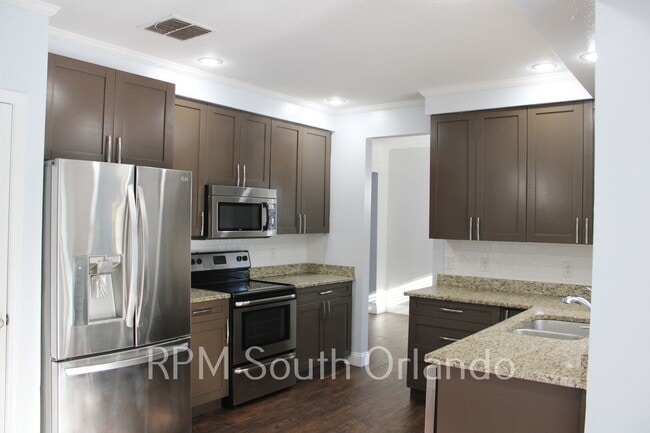 Building Photo - Kissimmee Pool home 4 bed 2.5 bath