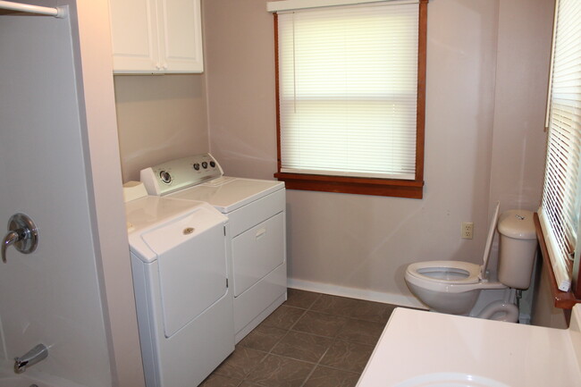 Main floor full bath with washer and dryer - 710 Clark st