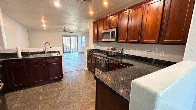 Building Photo - 36532 W Barcelona Ln