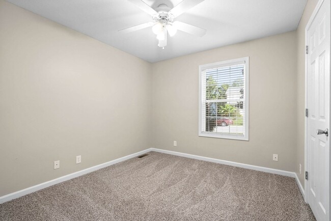 Building Photo - Pet Friendly Three Bedroom with Bonus!